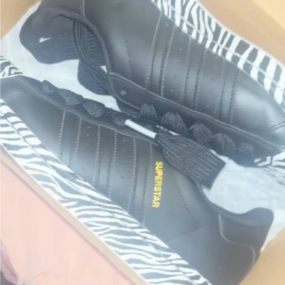 Adidas Black Sneakers with Sleek Design and Textured Upper